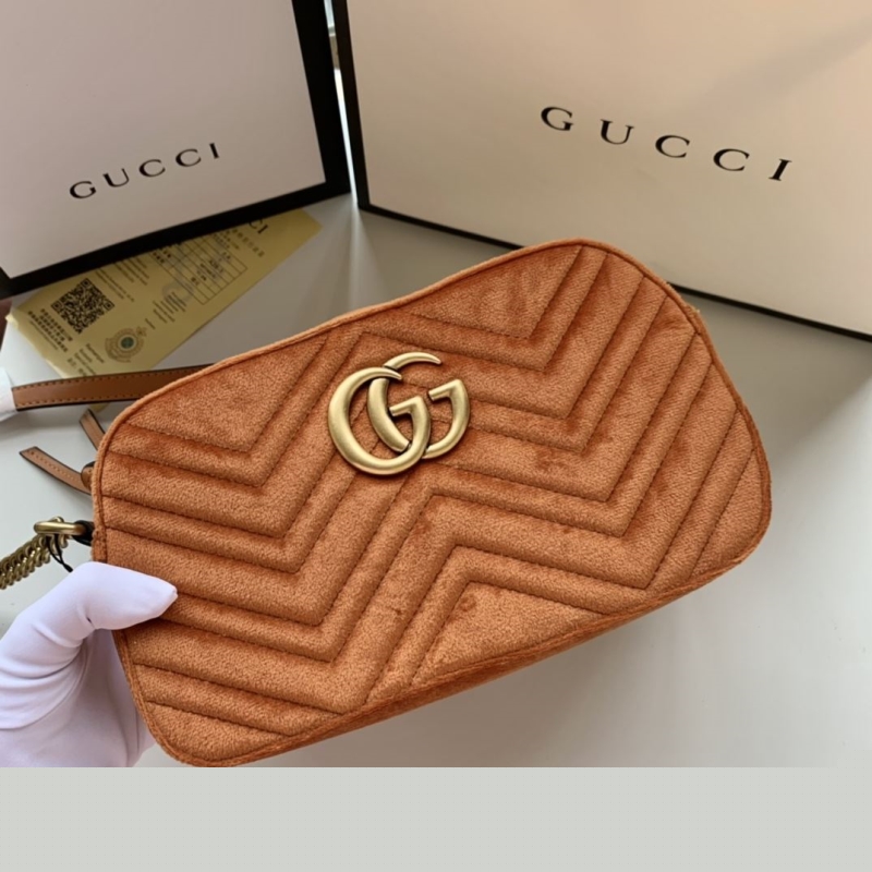 G*u*i clutch bags